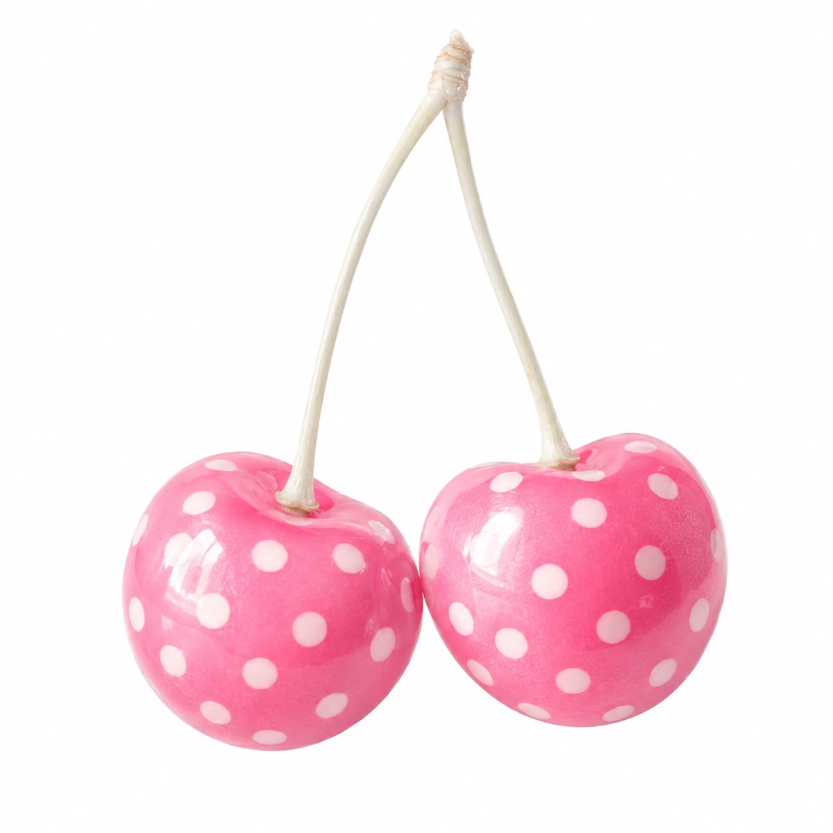 Two pink cherries with white polka dots